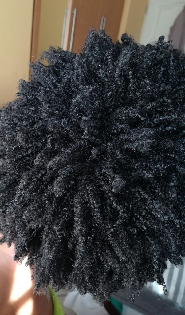 close-up of 4c hair tight coils