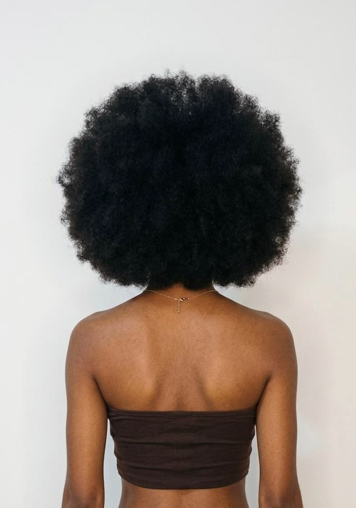 Full natural afro showing the volume of healthy afro hair