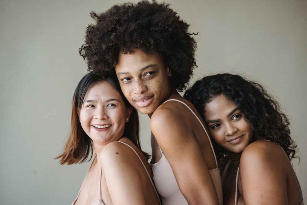 Women with different natural hair textures
