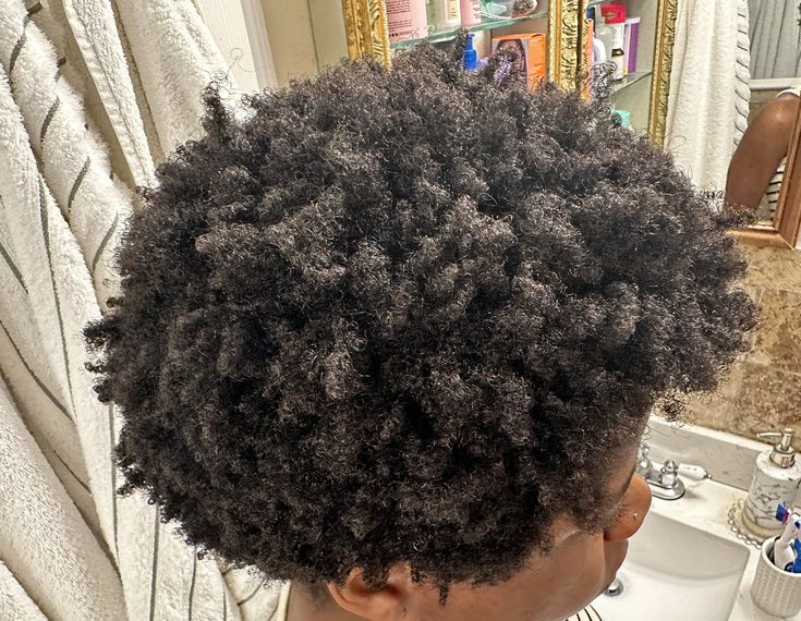 Healthy tightly coiled 4C hair strands