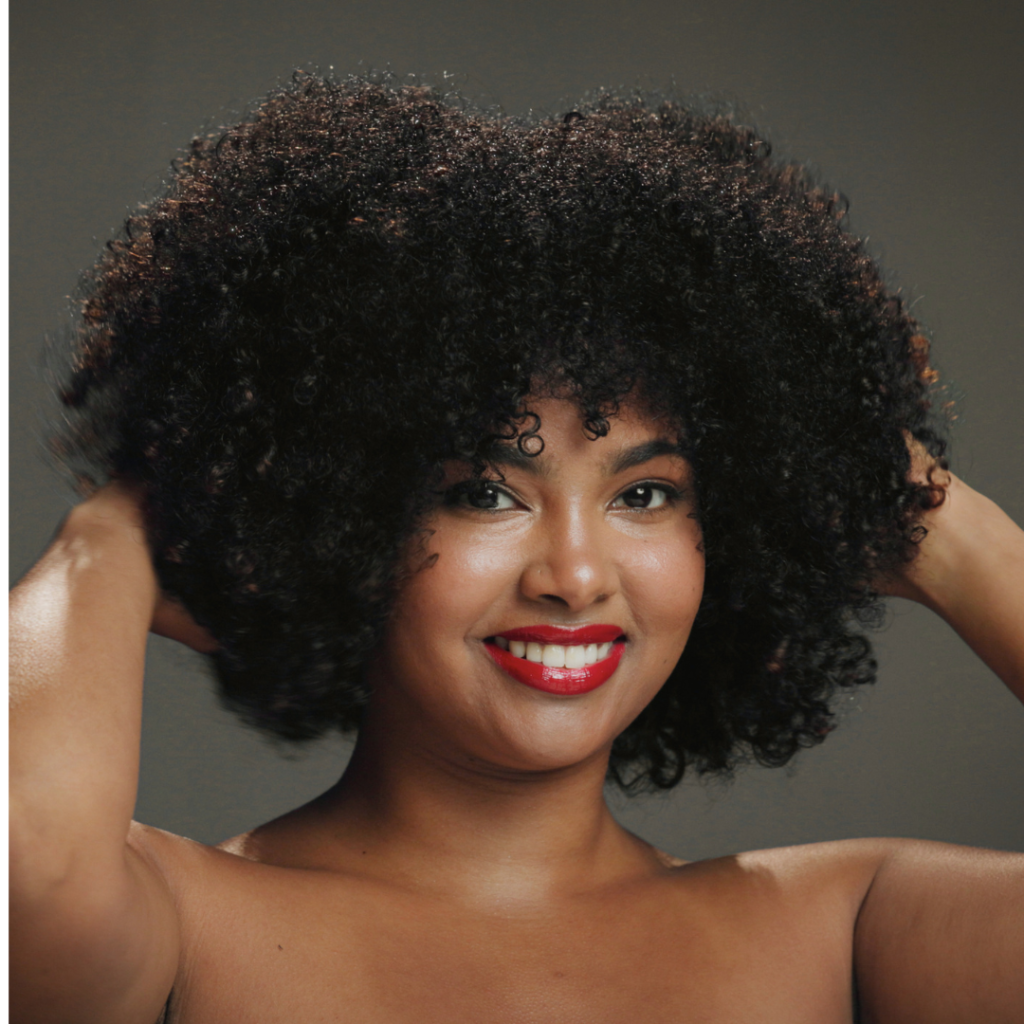 Healthy moisturized natural afro with visible shine