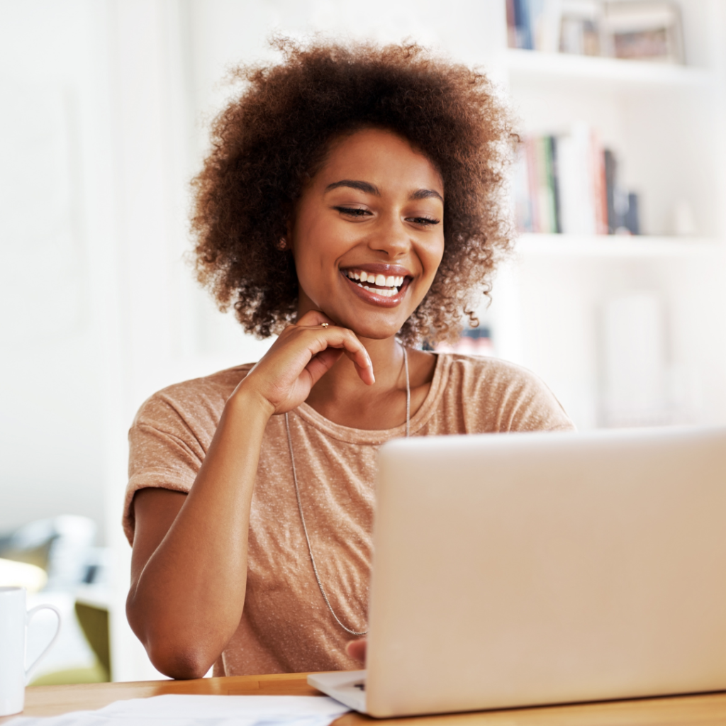 Woman learning about healthy natural hair care practices