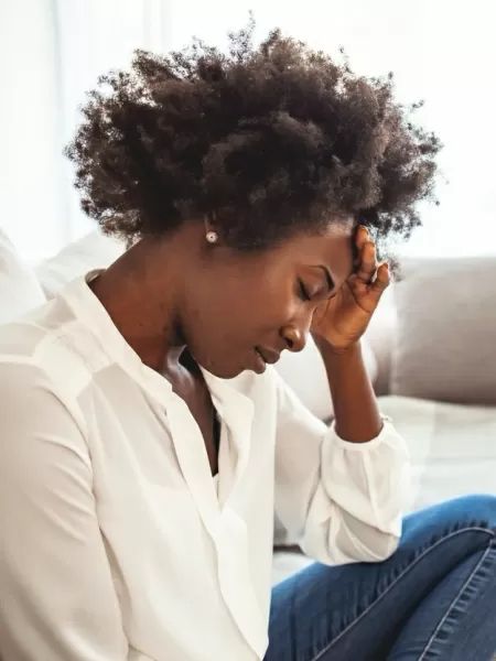 picture of lady worried over natural hair