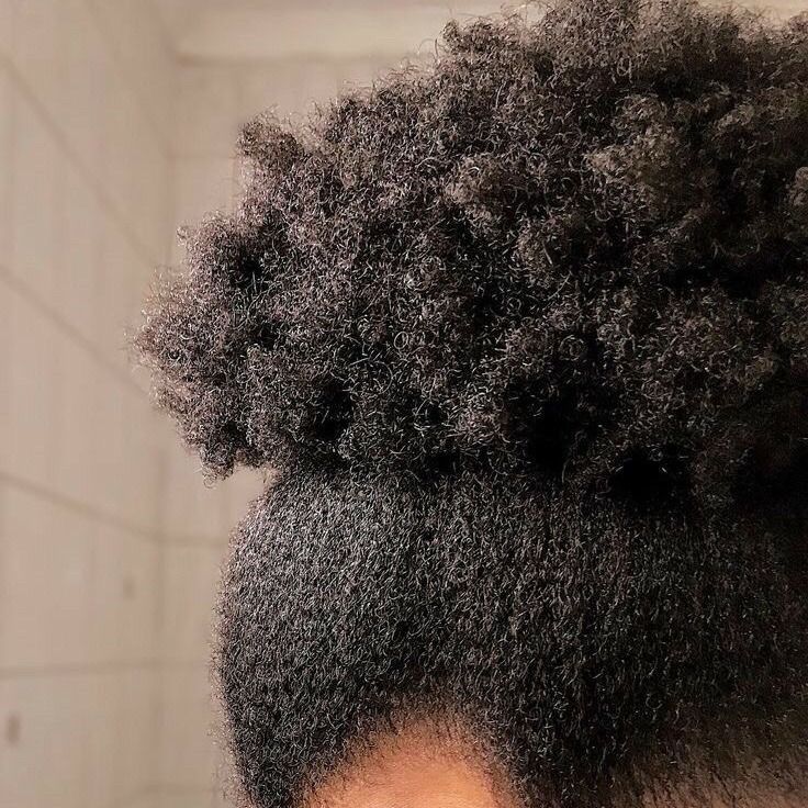Close-up of tightly coiled natural 4C hair texture