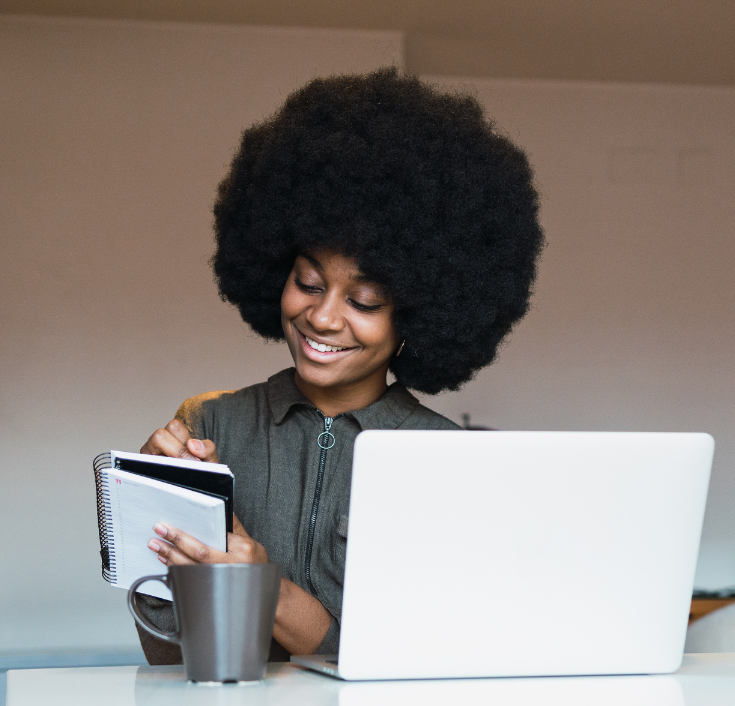 Black woman planning her natural hair wash schedule