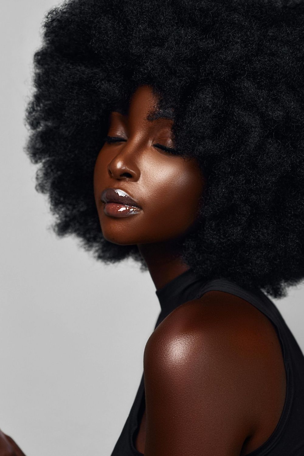 dark woman on beautiful afro hair