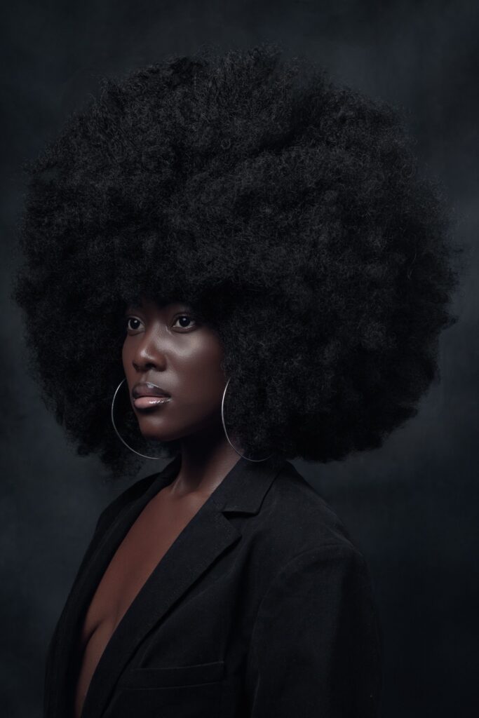 Woman with thick and dense natural 4C hair