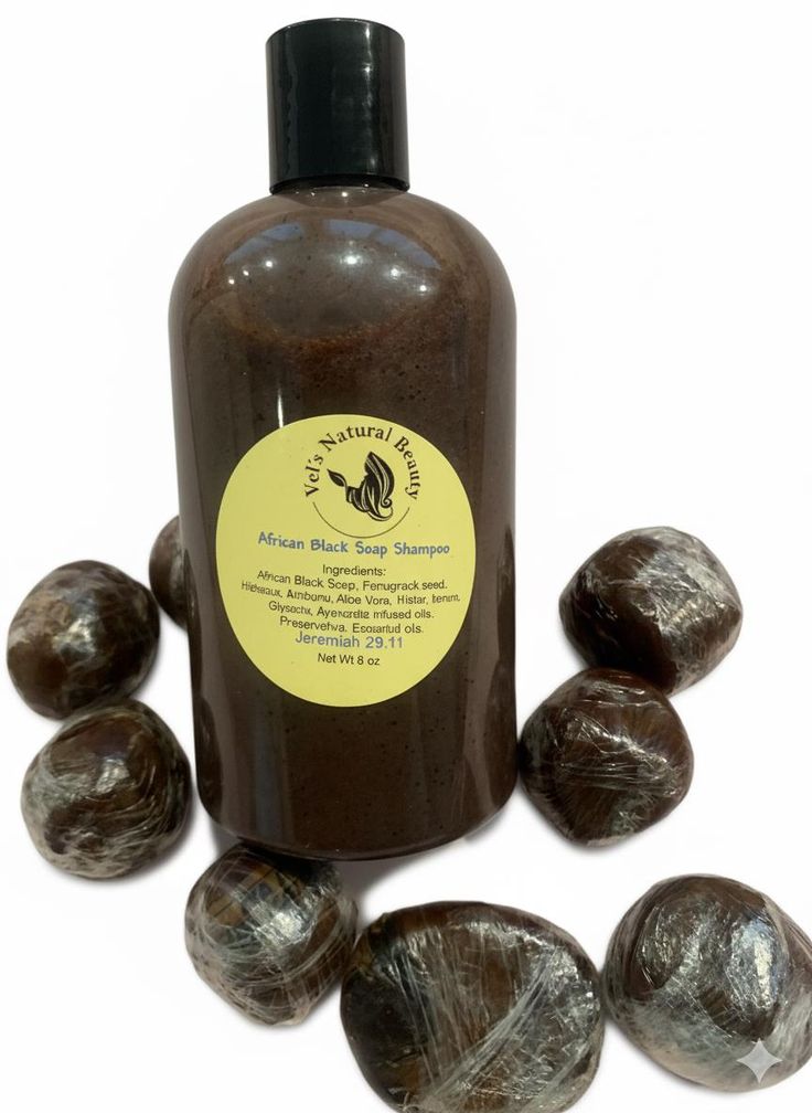 African black soap shampoo beside natural ingredients for 4C hair.