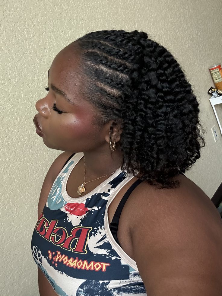 Natural 4C braid-out with flat twists at the front.