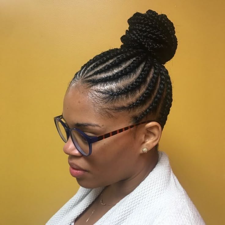Elegant braided updo on natural 4C hair.