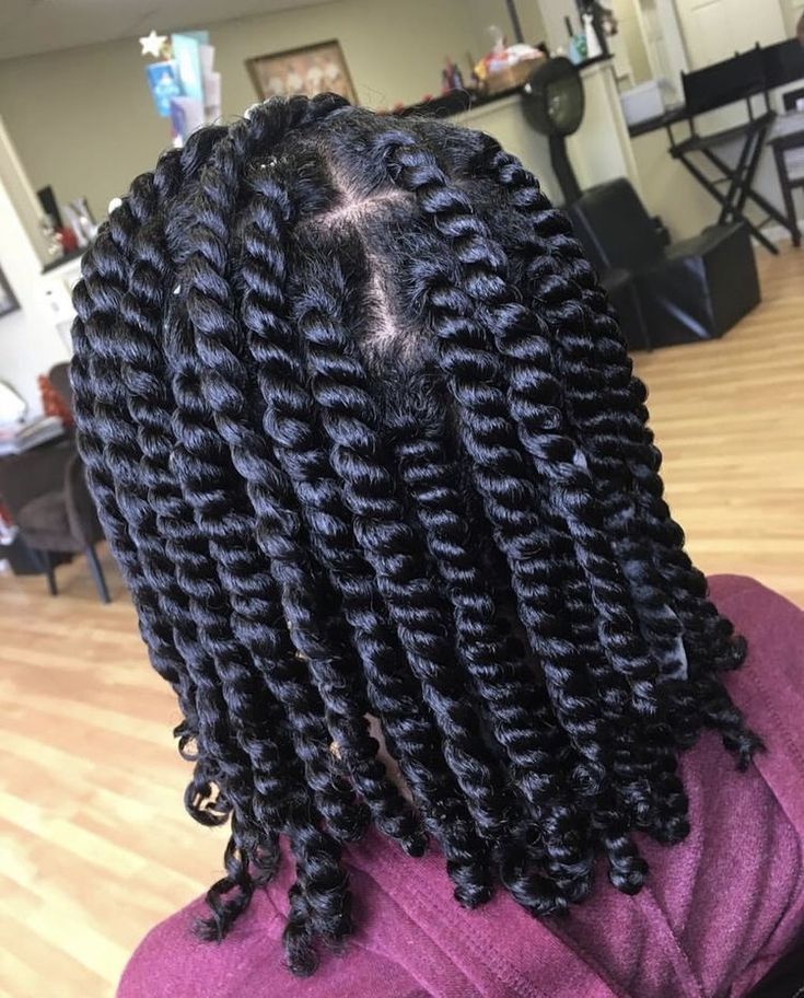 Chunky two-strand twists on healthy natural 4C hair.