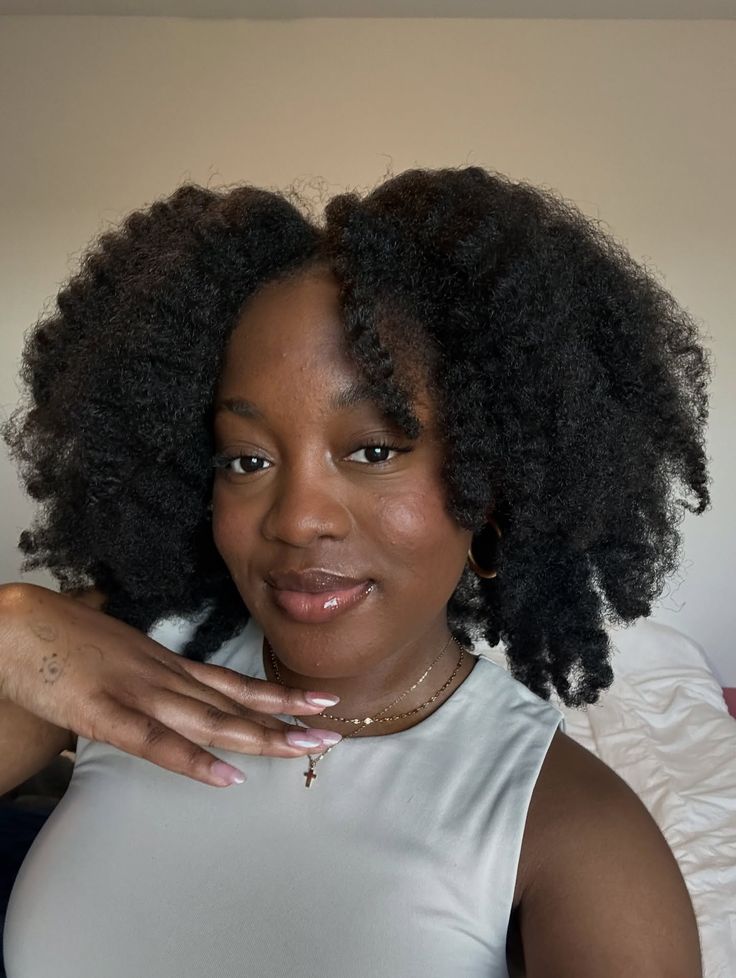 Classic fluffy style on natural 4C hair.