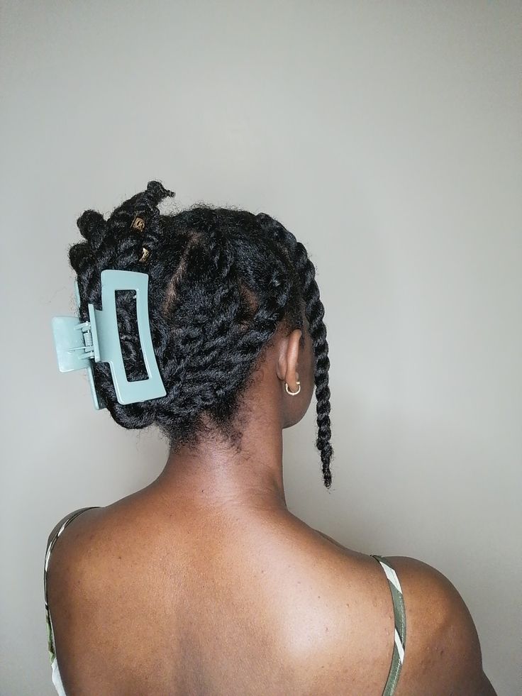 Claw clip twist hairstyle for beginners with 4C hair.