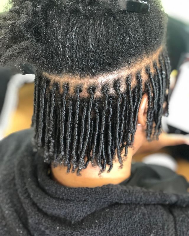 Comb coil starter locs on short natural 4C hair.