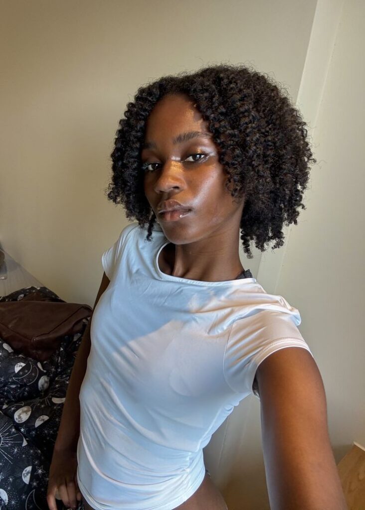 Defined braid-out on natural 4C hair.
