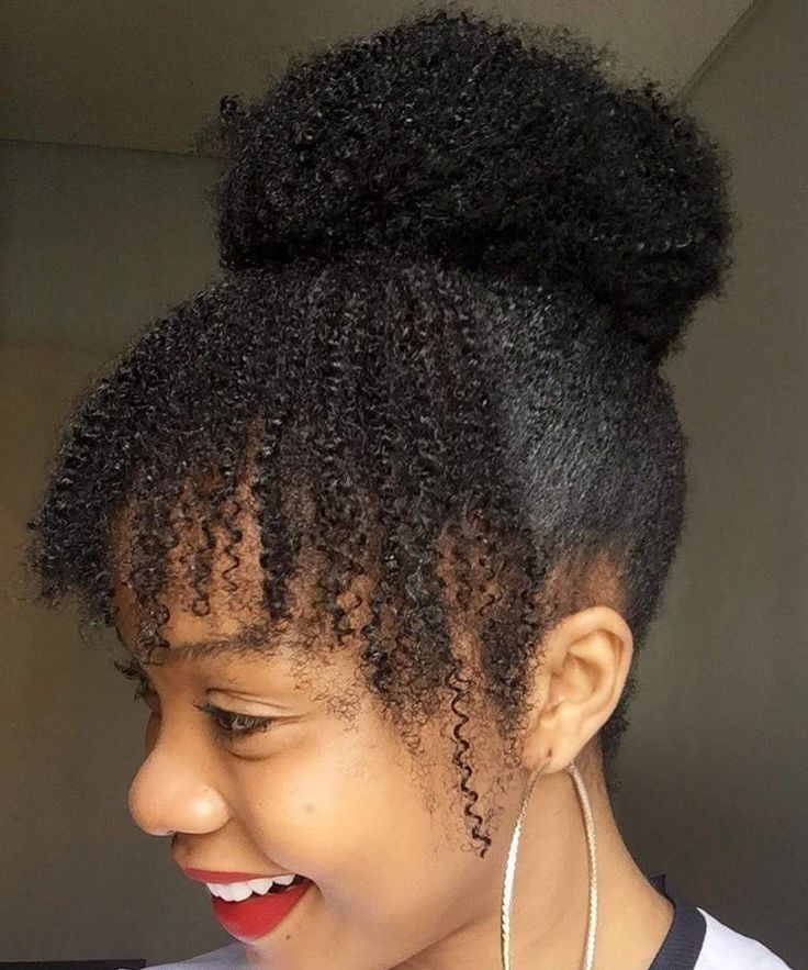 Faux bangs hairstyle on natural 4C hair.
