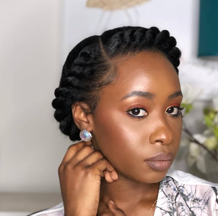 Flat twist crown hairstyle on natural 4C hair.
