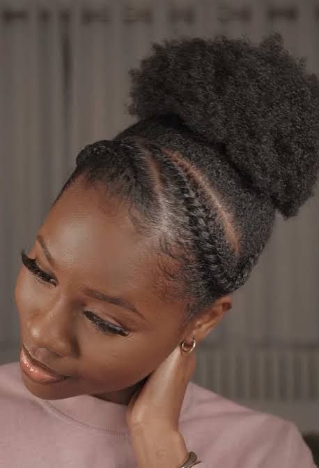 Elegant flat twist updo on natural 4C hair.