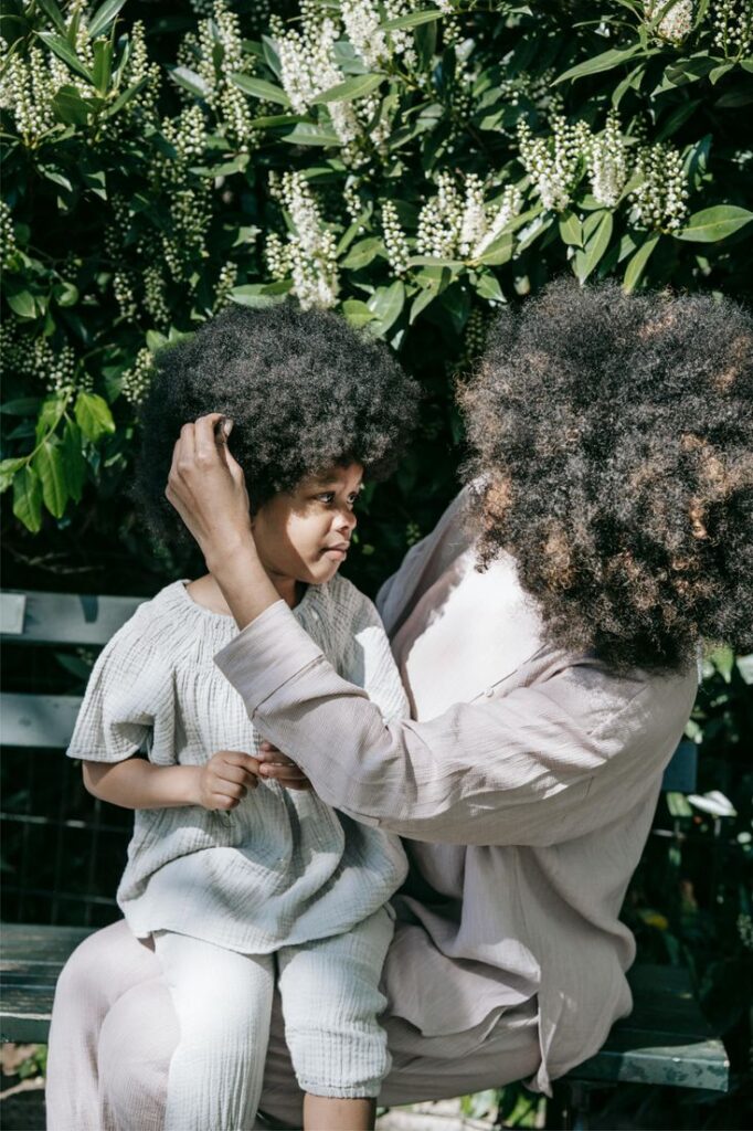 A mother and daughter with long 4c hair