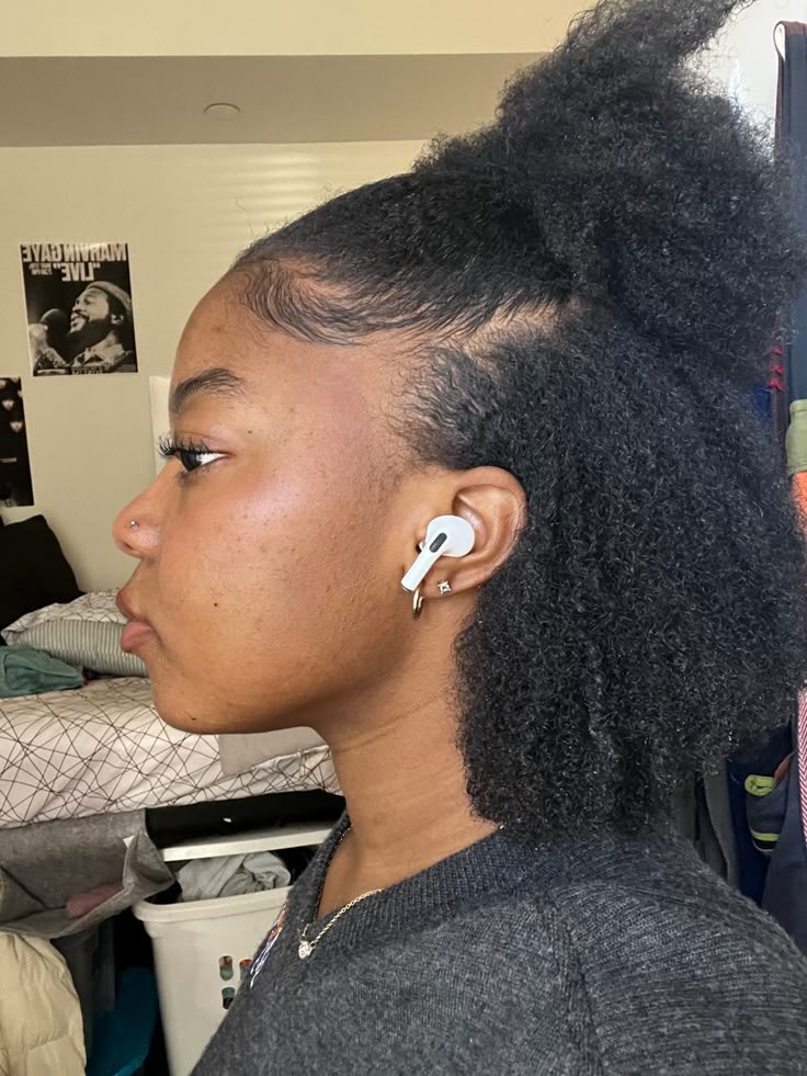 Half-up half-down puff hairstyle for beginners with 4C hair.
