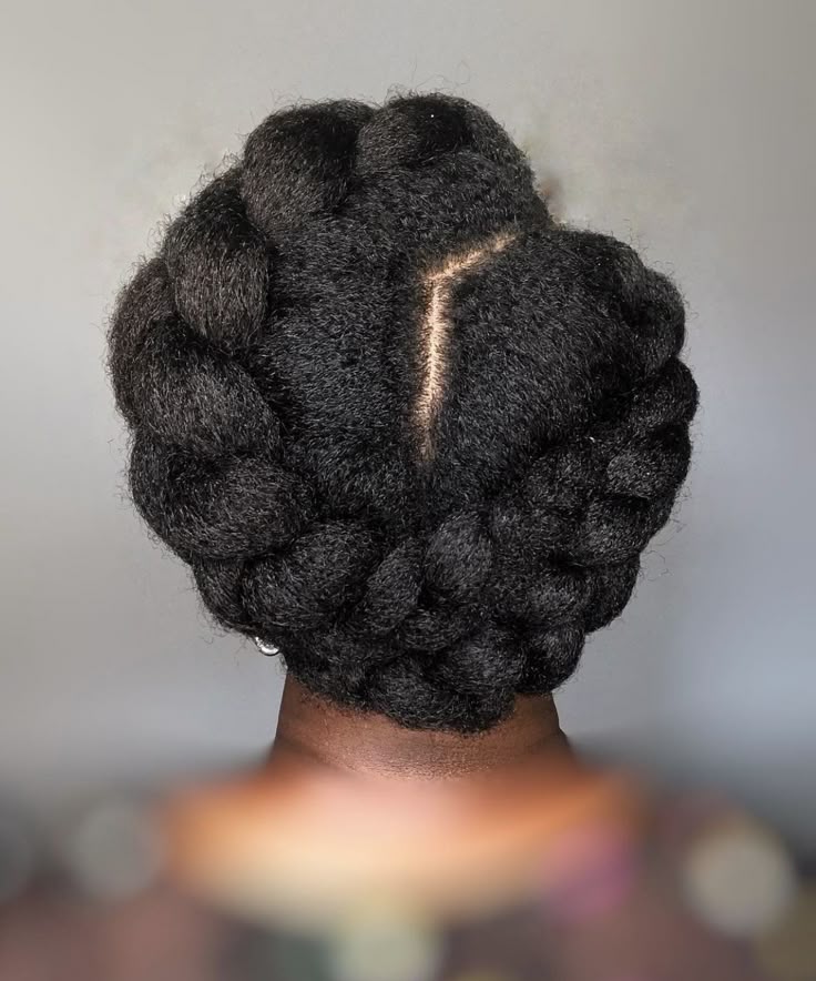 Halo braid hairstyle on natural 4C hair.