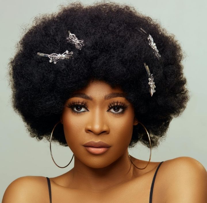 woman on healthy afro hair