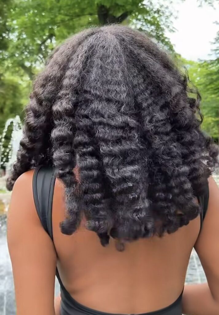 Jumbo braid-out on natural 4C hair.