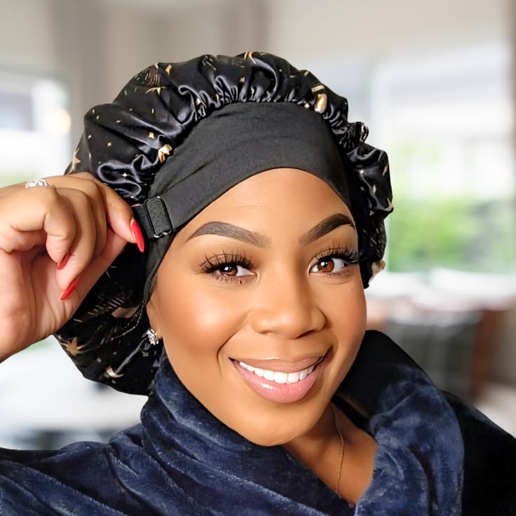 woman wearing satin bonnet to protect her locs