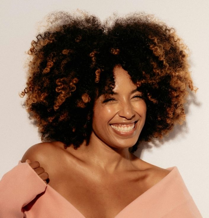 Black woman with a long and full afro hair