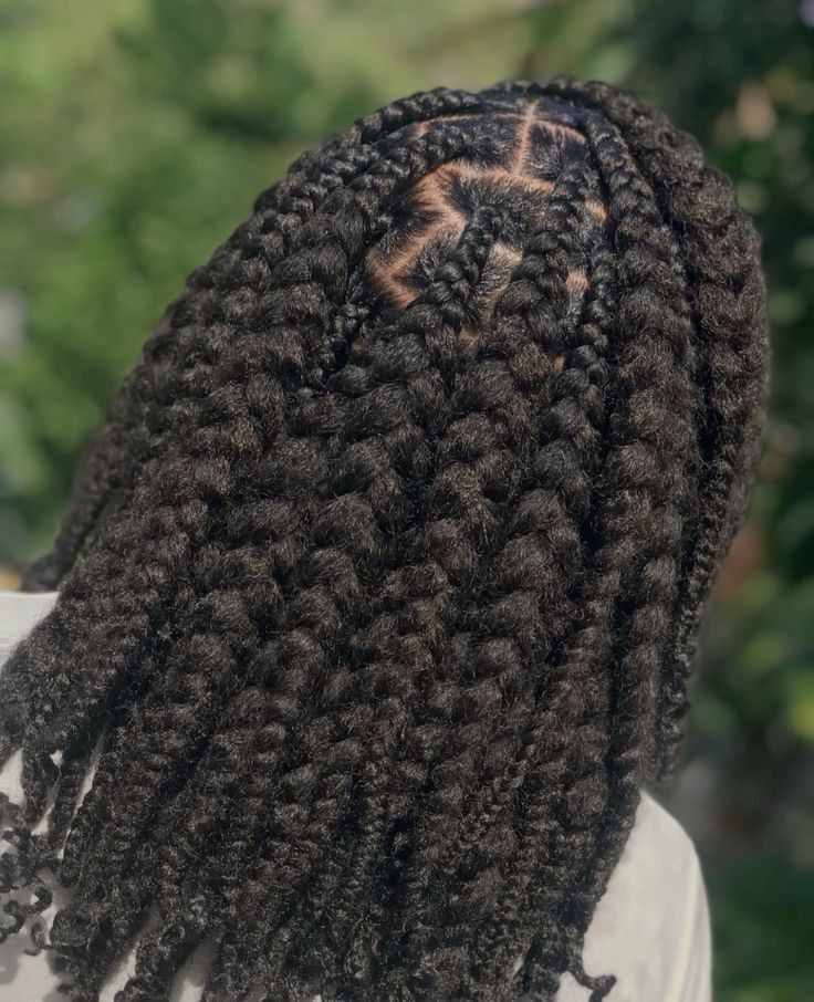loose braids protective style on woman