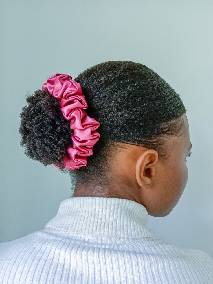 Low ponytail hairstyle for beginners with natural 4C hair.