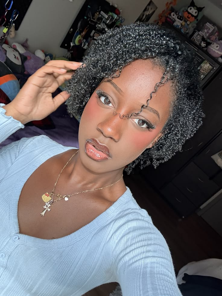 Mini braid-out on natural 4C hair.