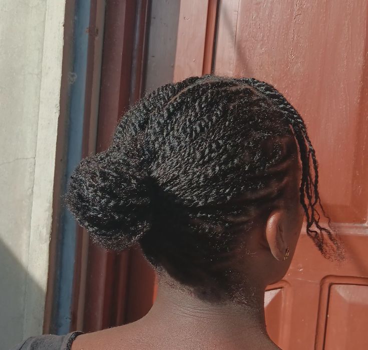 Mini twist bun hairstyle for beginners with natural 4C hair.