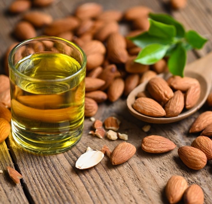 Pure sweet almond oil for natural 4C hair care.