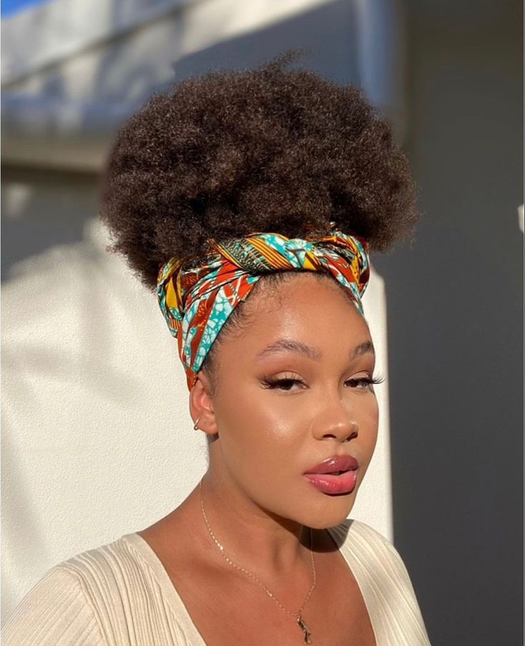 Satin scarf puff hairstyle for beginners with natural 4C hair.