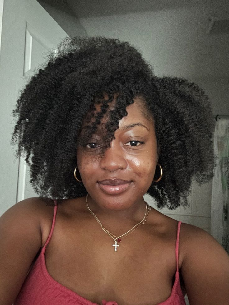 Side-part style on natural hair.