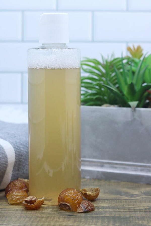 Natural soapnut shampoo prepared for washing 4C hair.