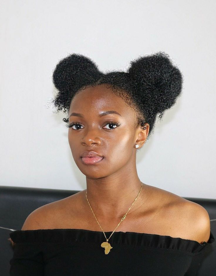 Space buns on natural hair.