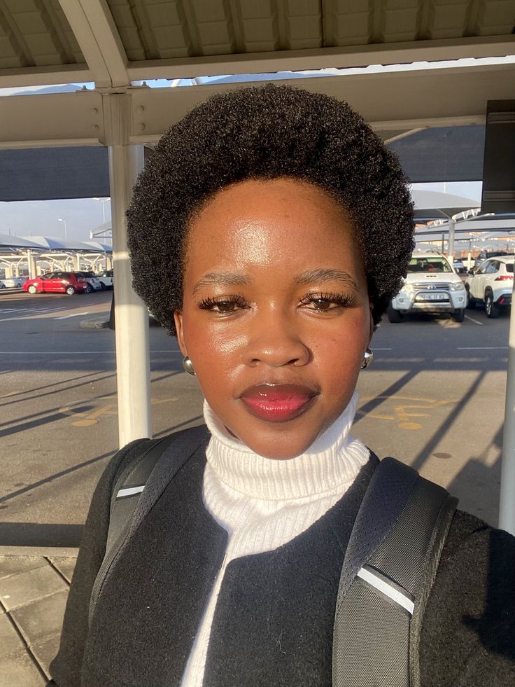 Teeny Weeny Afro (TWA) on natural 4C hair.