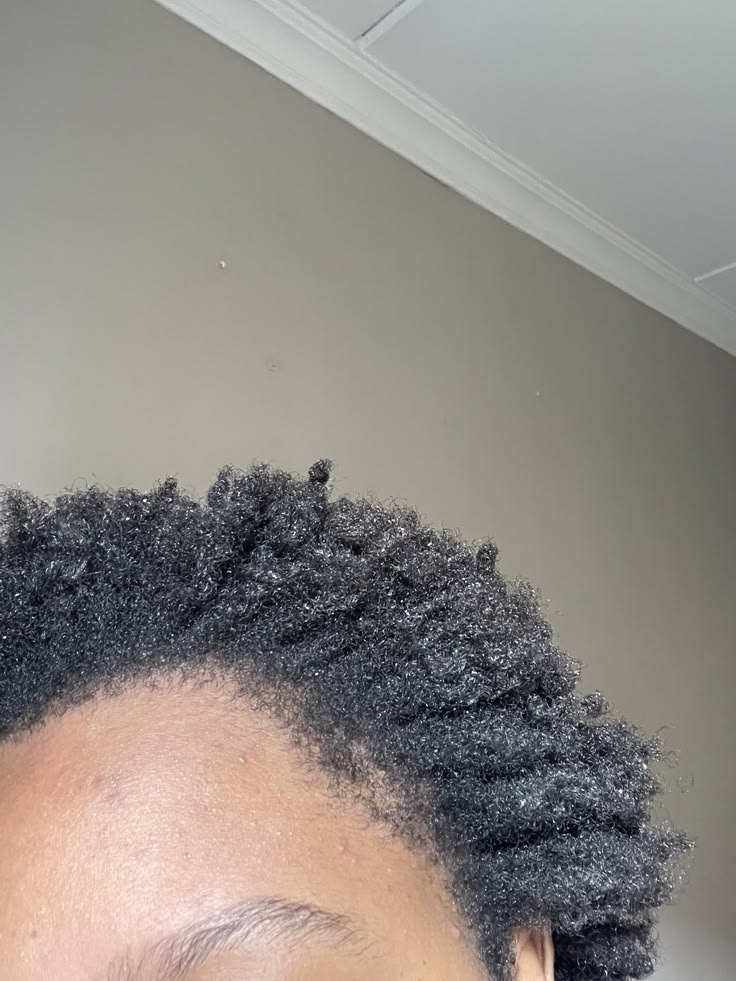 woman  with tightly coiled 4c hair