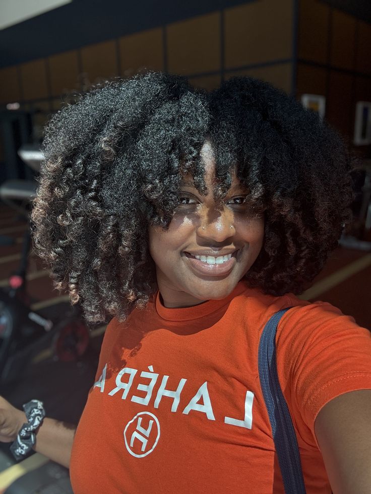 Voluminous braid-out on natural afro hair.