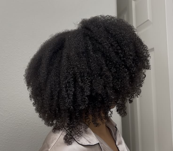 woman with soft shiny hair after deep conditioning