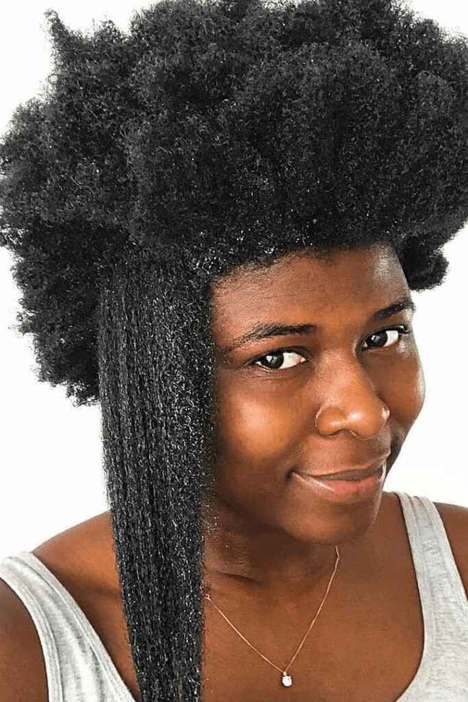 Natural 4C hair showing new growth and retained length