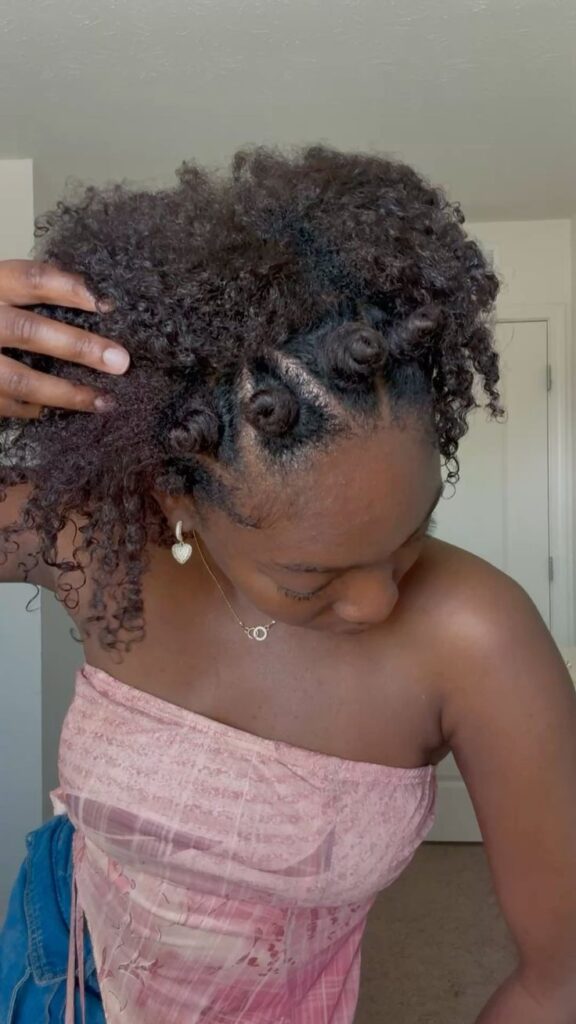 Bantu half-up half-down wedding hairstyle on natural 4C hair
