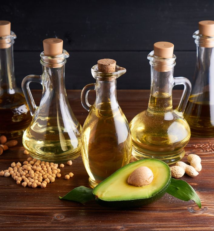 Natural oils commonly used to seal moisture in 4C hair.