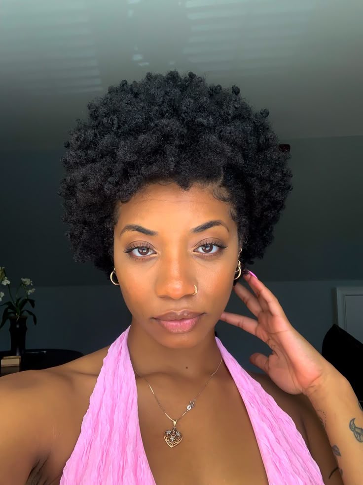 Healthy natural 4C hair representing common myths about transitioning and big chops.