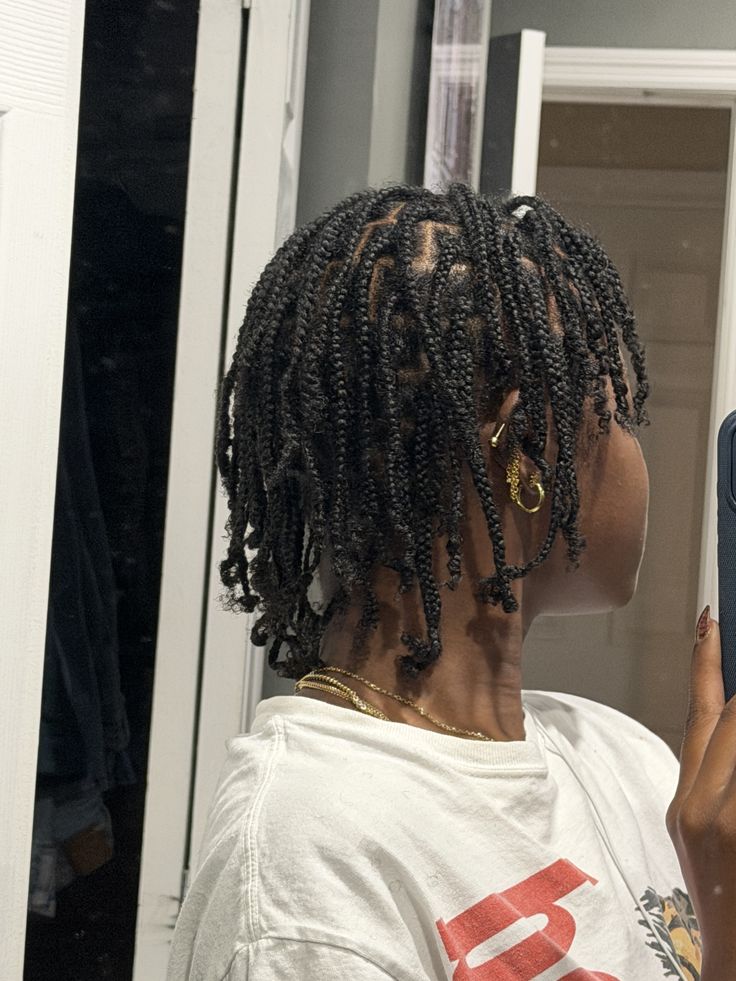 Natural 4C hair in braids prepared for a braid-out