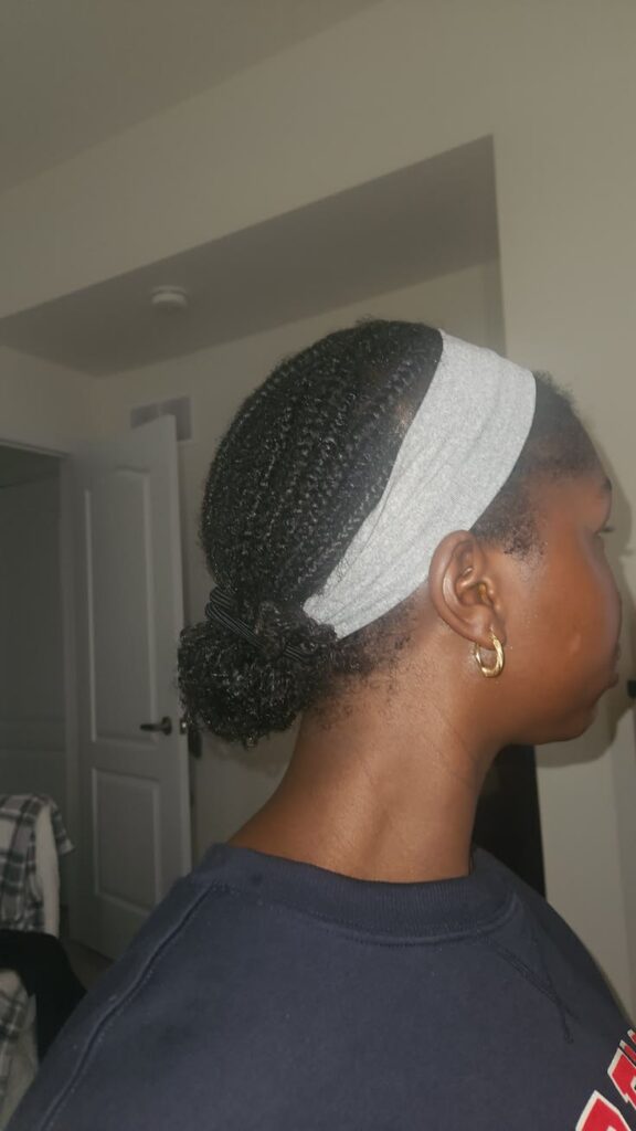 Braided low bun on natural 4C hair
