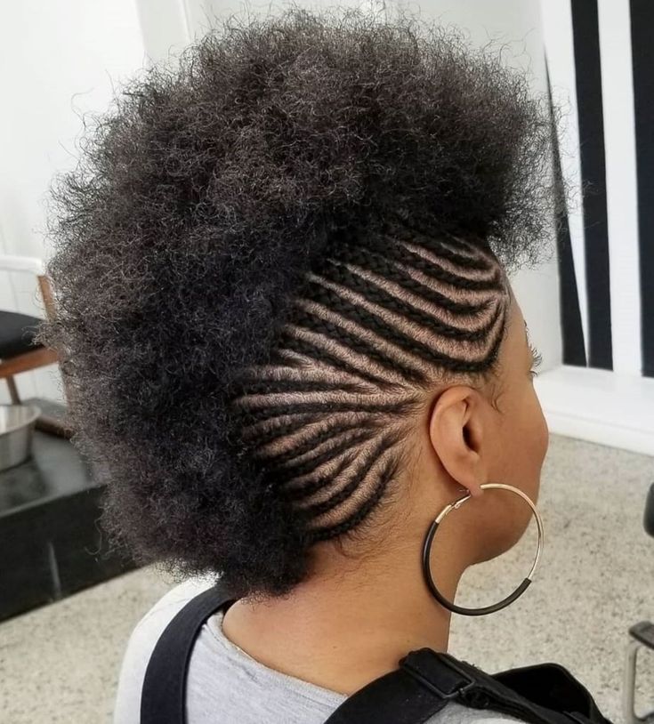 Natural 4C hair styled into a braided mohawk