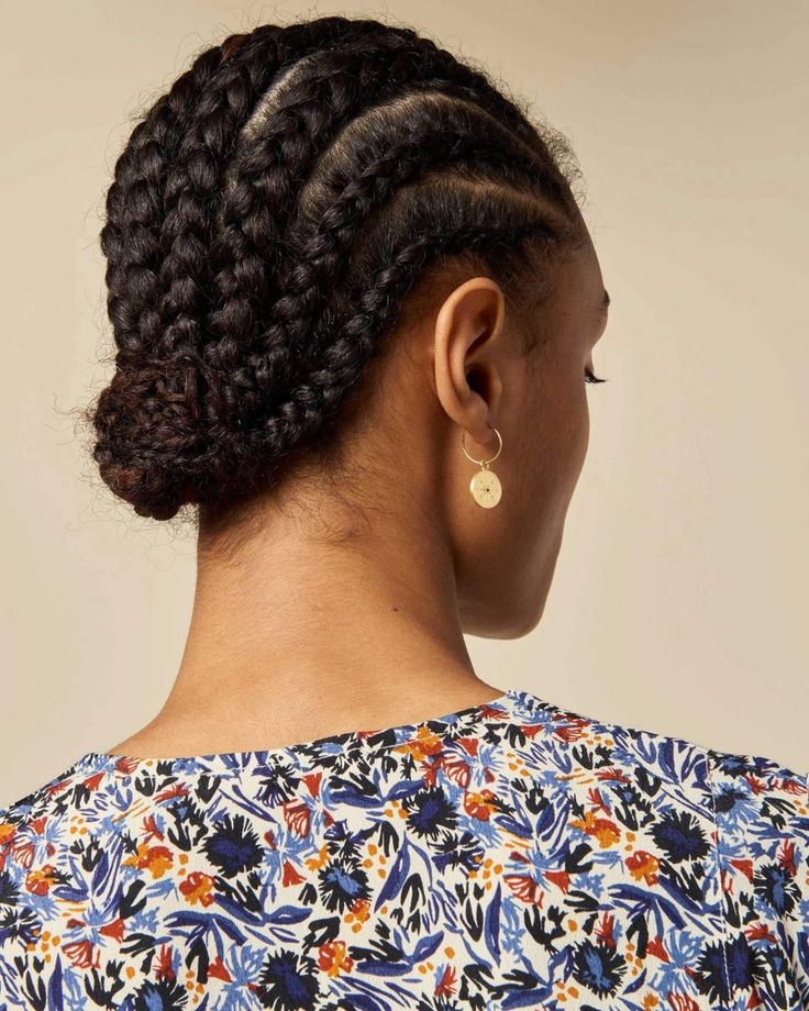 protective Cornrows styled into a bun